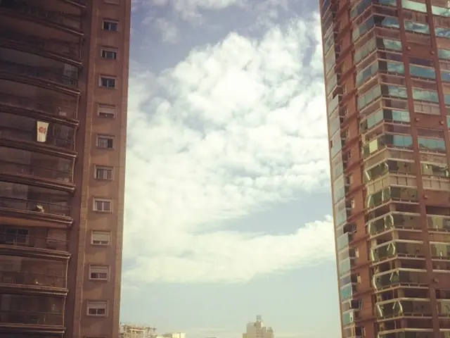 Urban heatwave intensification: potential role of air conditioners in city temperature rise