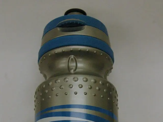 In this image i can see a bottle with a name of discovery on it.